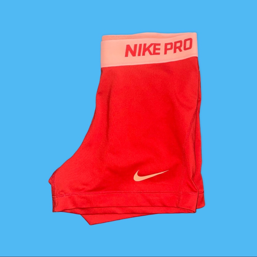 Women’s red/Orange Nike Pro Spandex Shorts. Size Medium.
